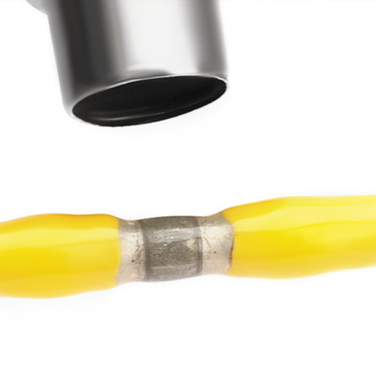 Solder seal butt connectors on yellow dual-insulated wire. Silver sleeve, heat-shrink, professional splice.