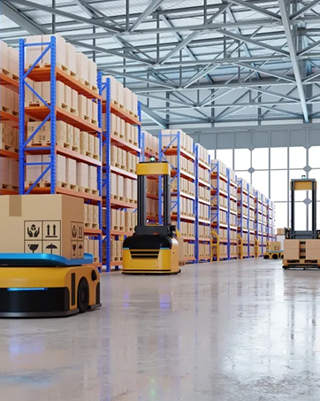 Automated warehouse aisle with tall storage racks and guided vehicle