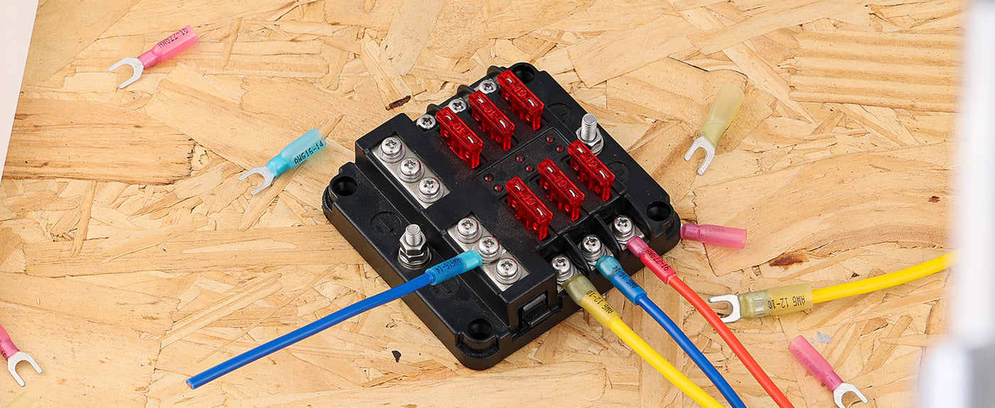 Fork terminal connections mounted on a fuse distribution block, providing stable power transfer and easy maintenance access.