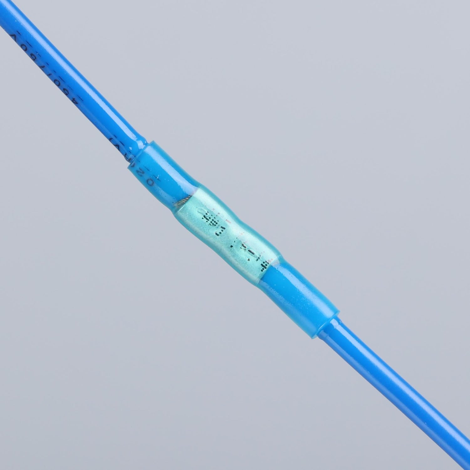 Color-coded blue butt connector sleeves