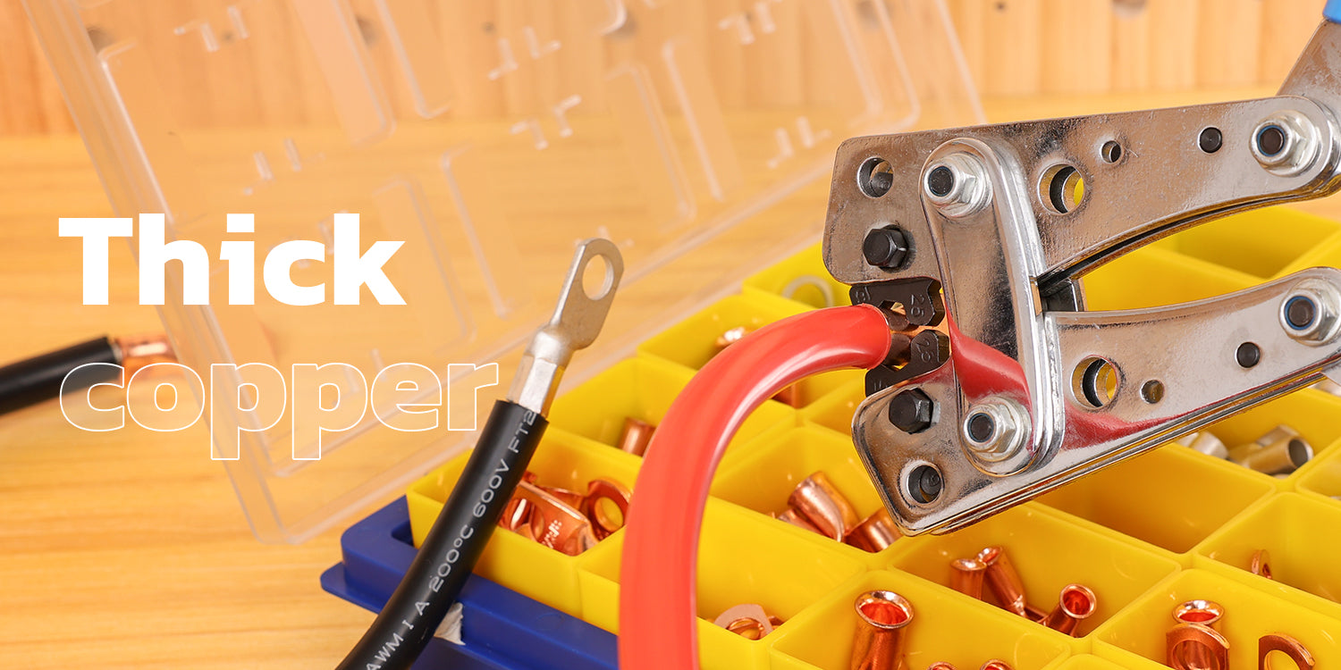 Close-up crimping a cable lug onto thick power wire; sturdy tool and organized copper terminals box shown on workbench.
