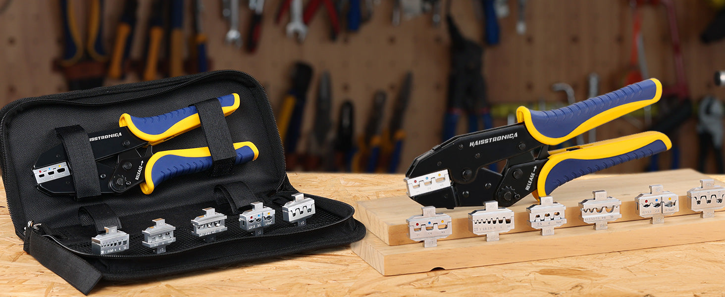 Workshop shot of Haisstronica crimper connector kit with color coded dies laid on bench for tidy electrical projects.